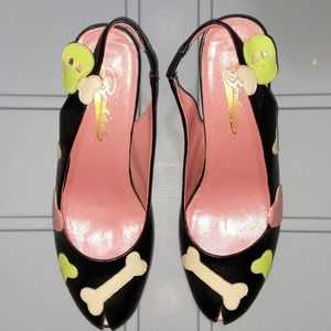 Bone and skull slingback pumps